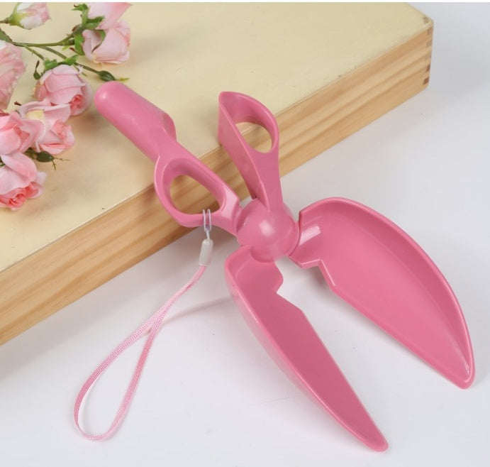 Pet dog picking up the toilet