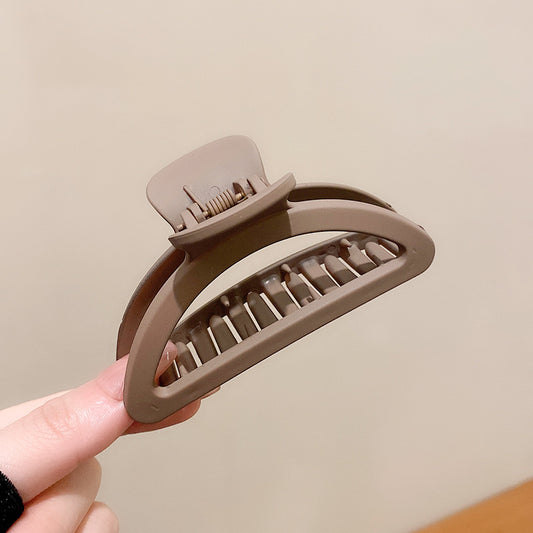 Take A Bath Plate, Hair Clip, The Back Of The Woman's Head